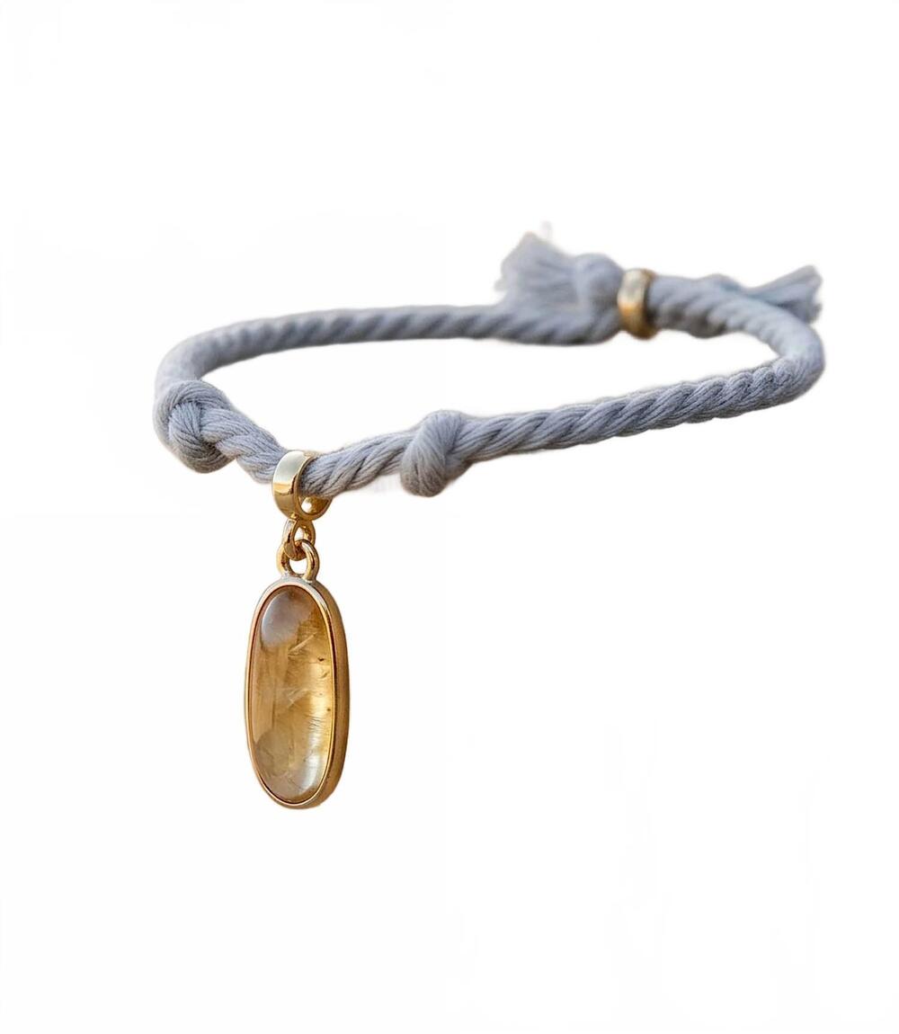 NEW SYLVIA BENSON women's oval gemstone cord bracelet in gray
